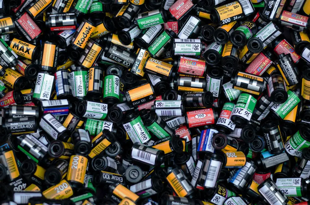 a pile of 35mm film canisters