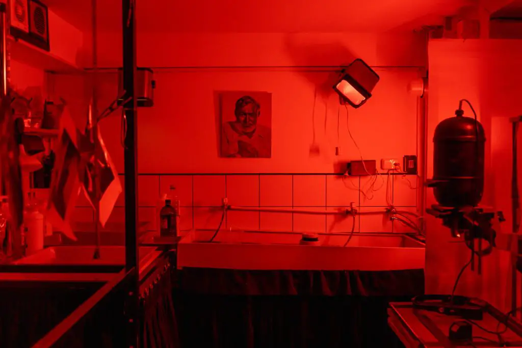 A Darkroom with a red safelight. 