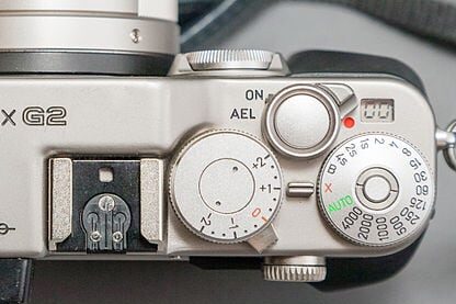 All About The Contax G2 35mm Film Camera: Why Is It So Good? 3 Top of the Contax G2 35mm film camera. Note the Exposure count LCD display beside the red dot and above the shutter speed dial.