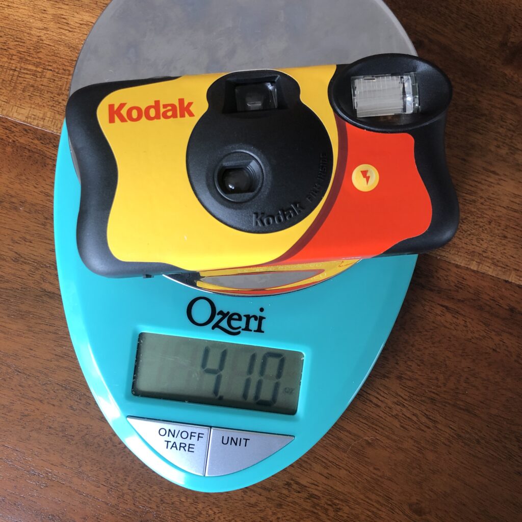 How To Safely Mail Film for Developing? The Cost And Things to Consider. 7 A Kodak Disposable Film camera that weighs 4.10 oz (or 116.2 g)