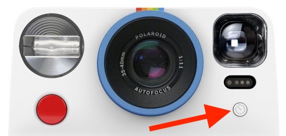 The self-timer button located on the front of the Polaroid Now I-Type below viewfinder next to the camera lens