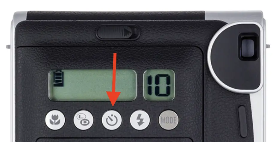 Is There An Instax With A Timer? 7 Self Timer Button on the back of Instax Mini 90 Neo Classic